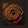 108 sandalwood mala beads with tassel on linen