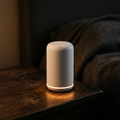 Portable white noise sleep machine with warm glow